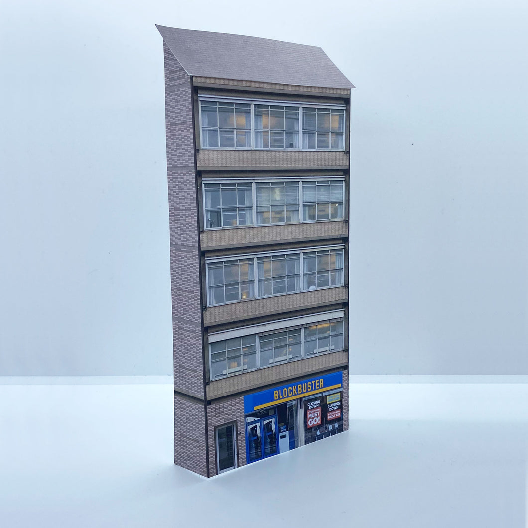 Low relief OO gauge building with shops from the 80s and 90s