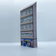 Load image into Gallery viewer, Low relief OO gauge building with shops from the 80s and 90s