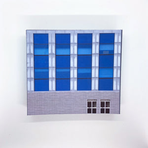 Modern OO gauge city building with blue windows