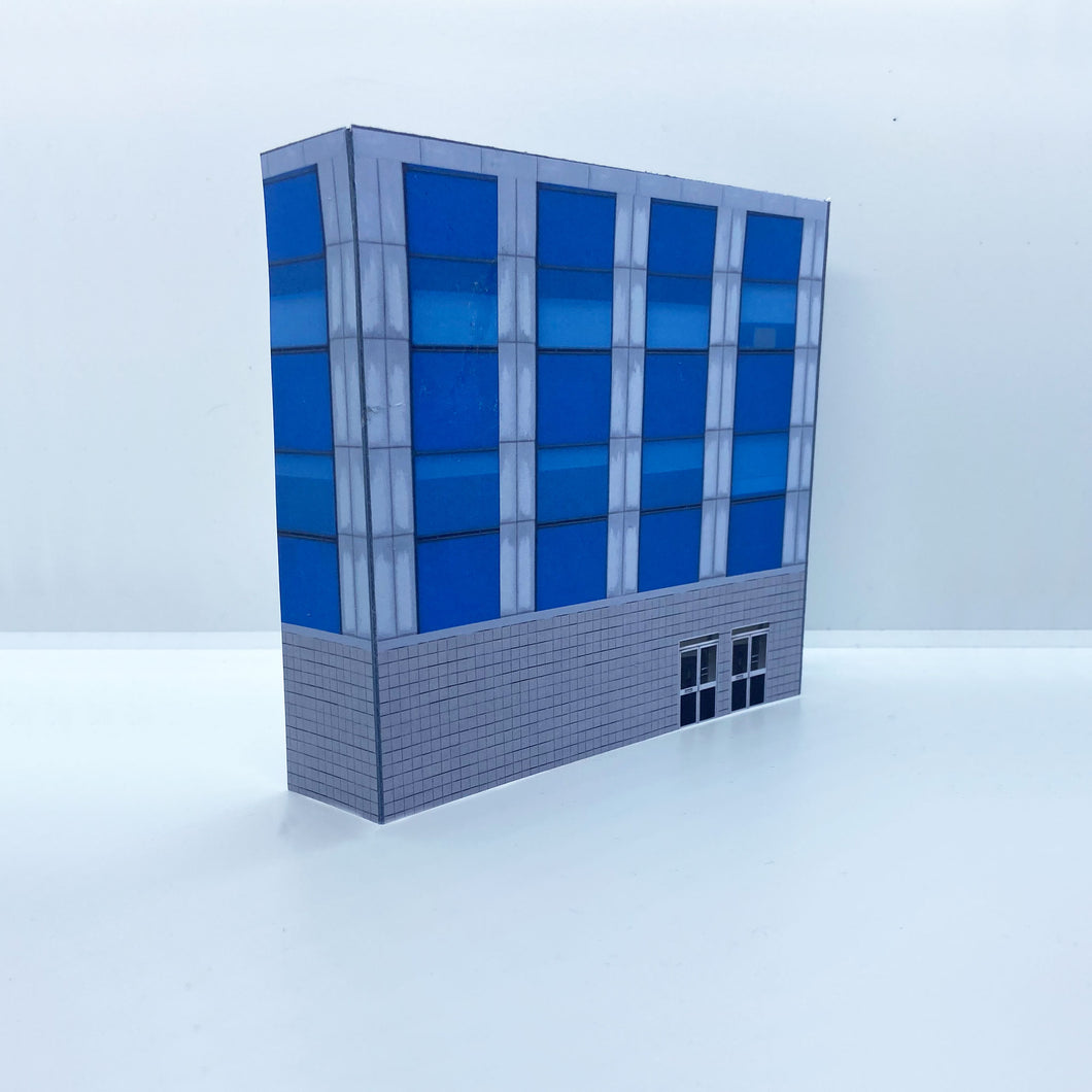 Modern OO gauge city building with blue windows